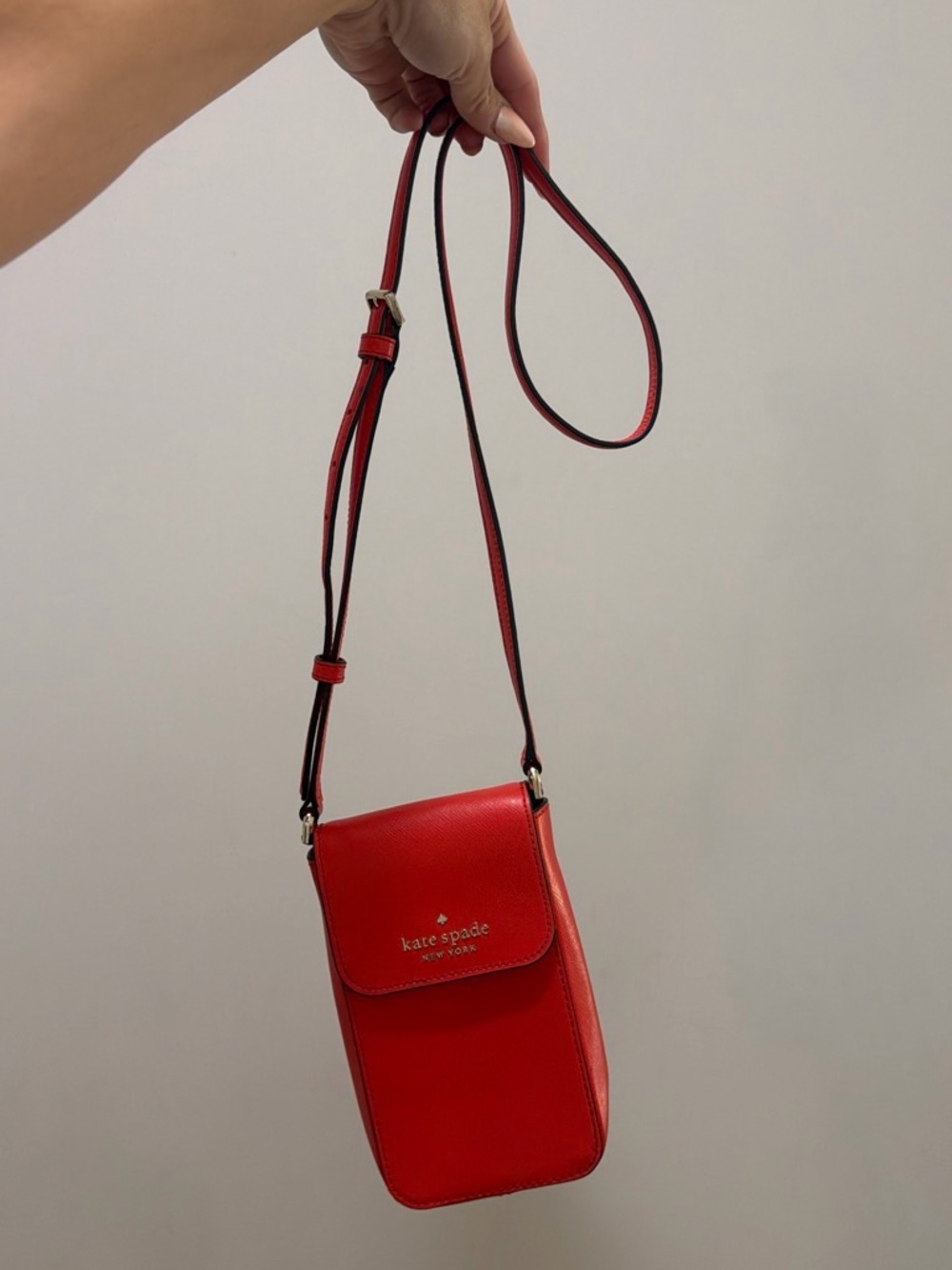 kate spade red leather crossbody phone bag with adjustable strap